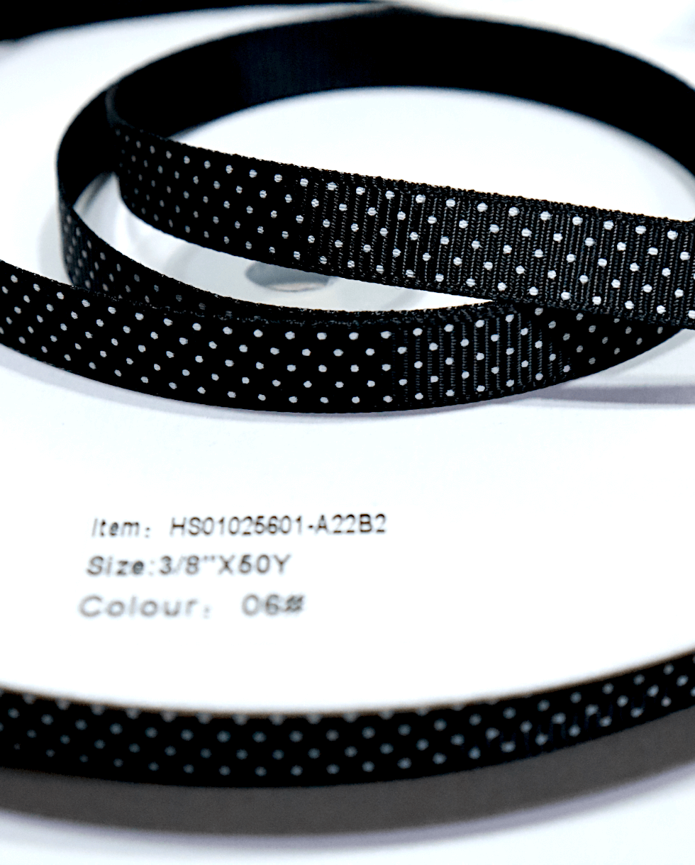 ริบบิ้นผ้ากรอสเกรน กว้าง 10 มิล ยาว 50 หลา ลายจุด สีดำจุดขาว 06#